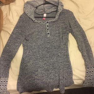 Long sleeve sweater with hood.